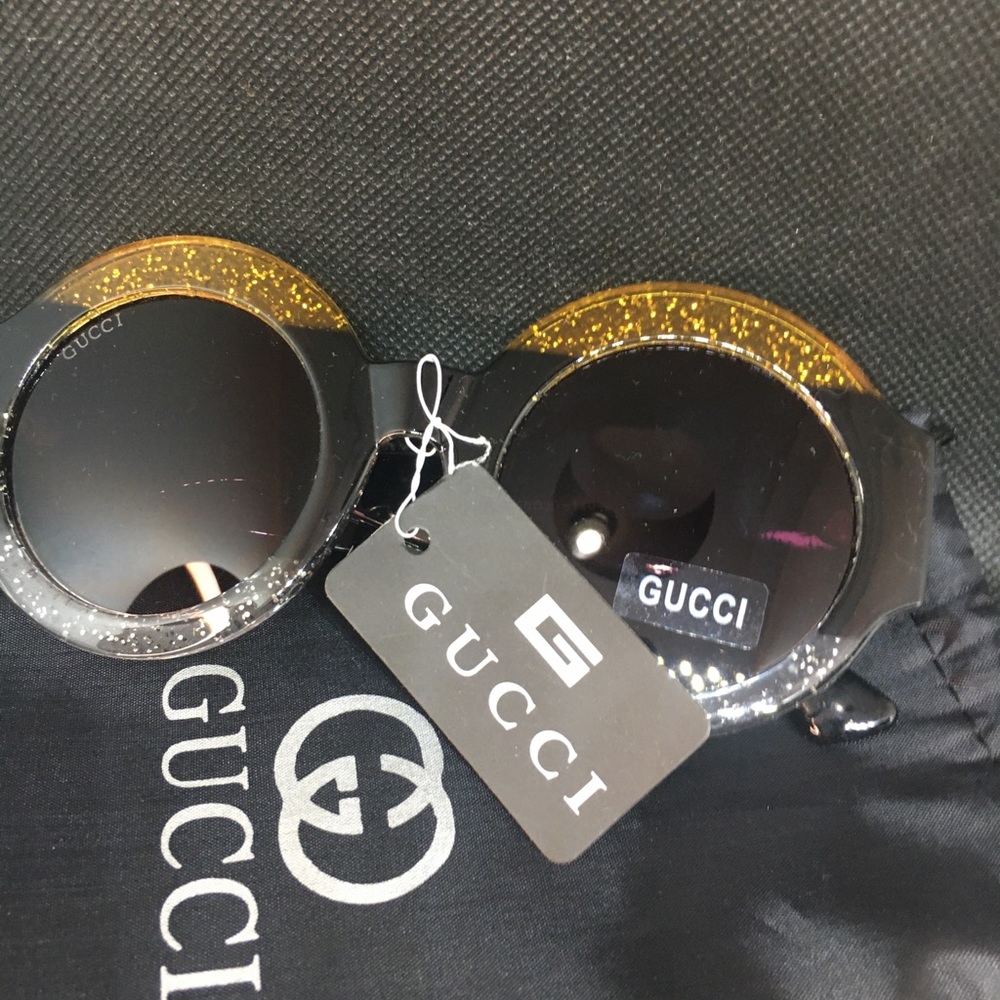 Gucci glitter glasses with sun glass shield bag
